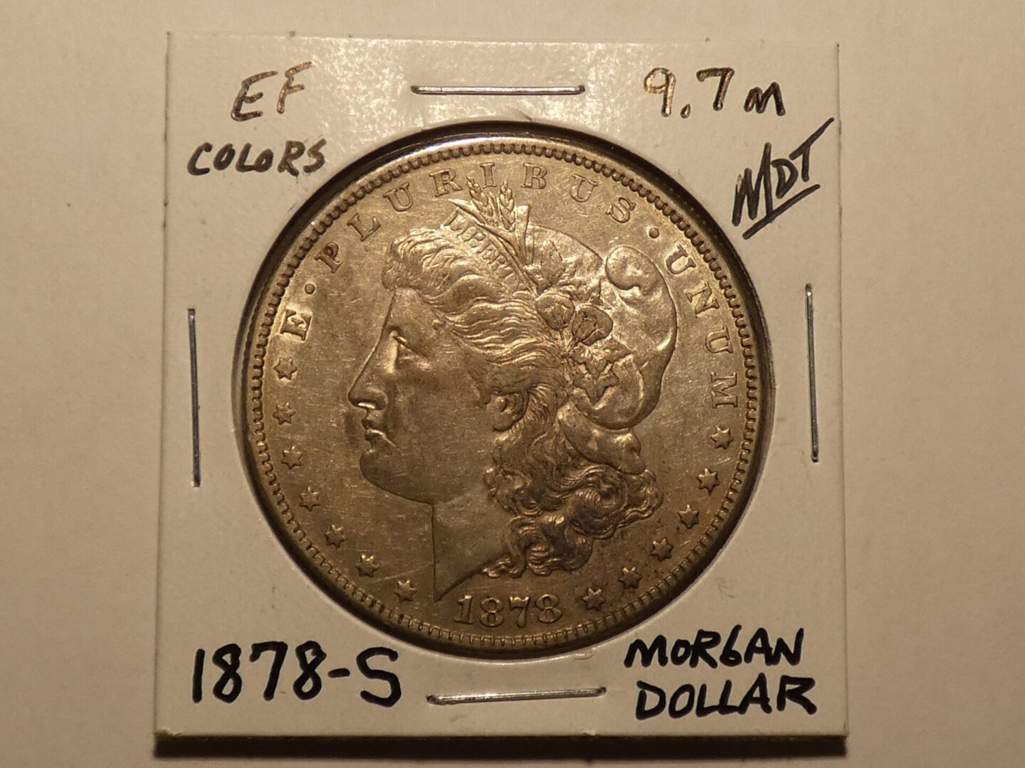 1878-S Morgan silver dollar coin.