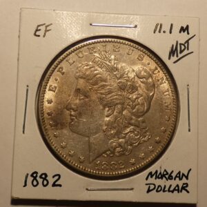 1882 Morgan silver dollar coin.