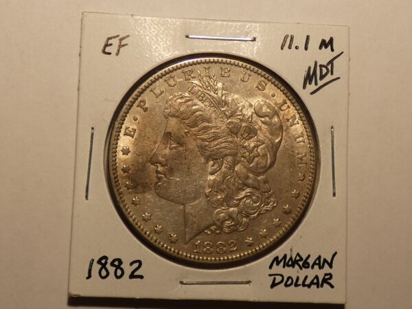 1882 Morgan silver dollar coin.