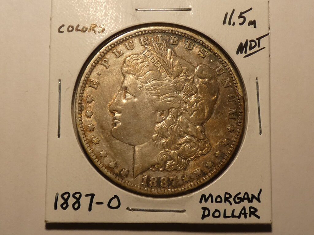 1887 Morgan silver dollar coin.