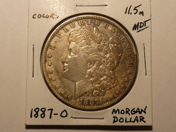 1887 Morgan silver dollar coin.