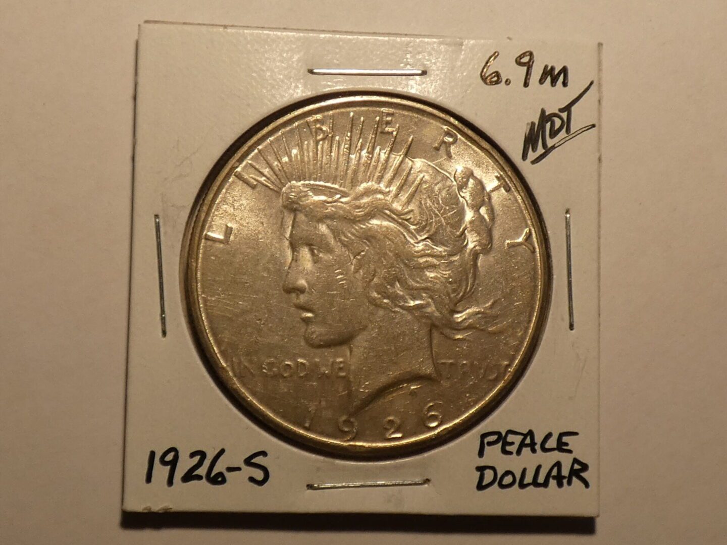 1926-S Peace Dollar silver coin.