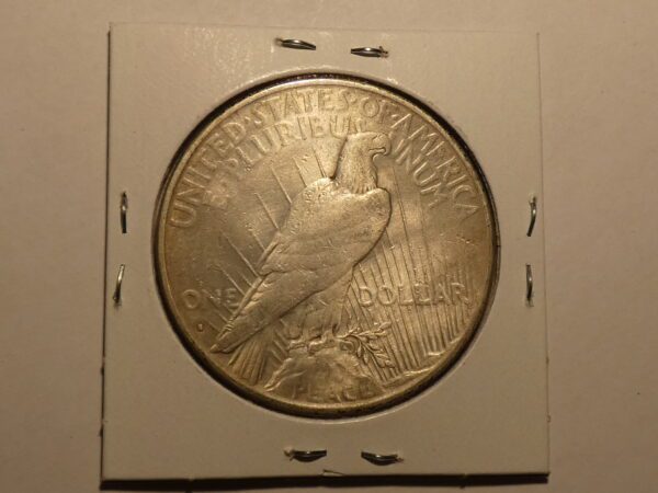 Silver Peace Dollar coin with an eagle.