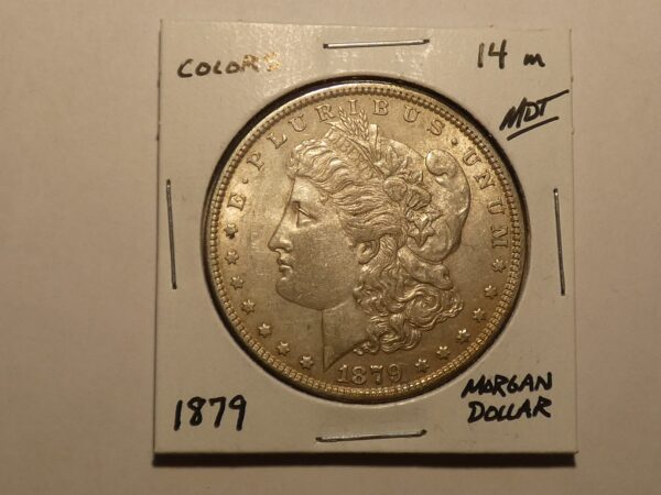 1879 Morgan silver dollar coin.