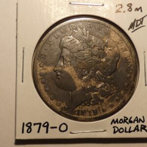 1879 Morgan silver dollar coin.