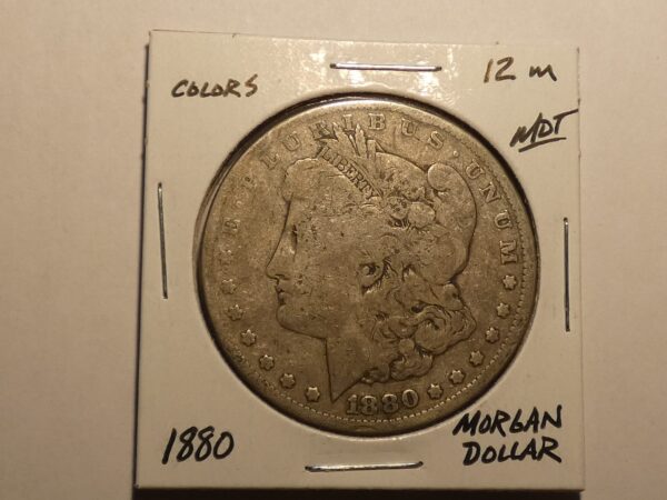 1880 Morgan silver dollar coin.