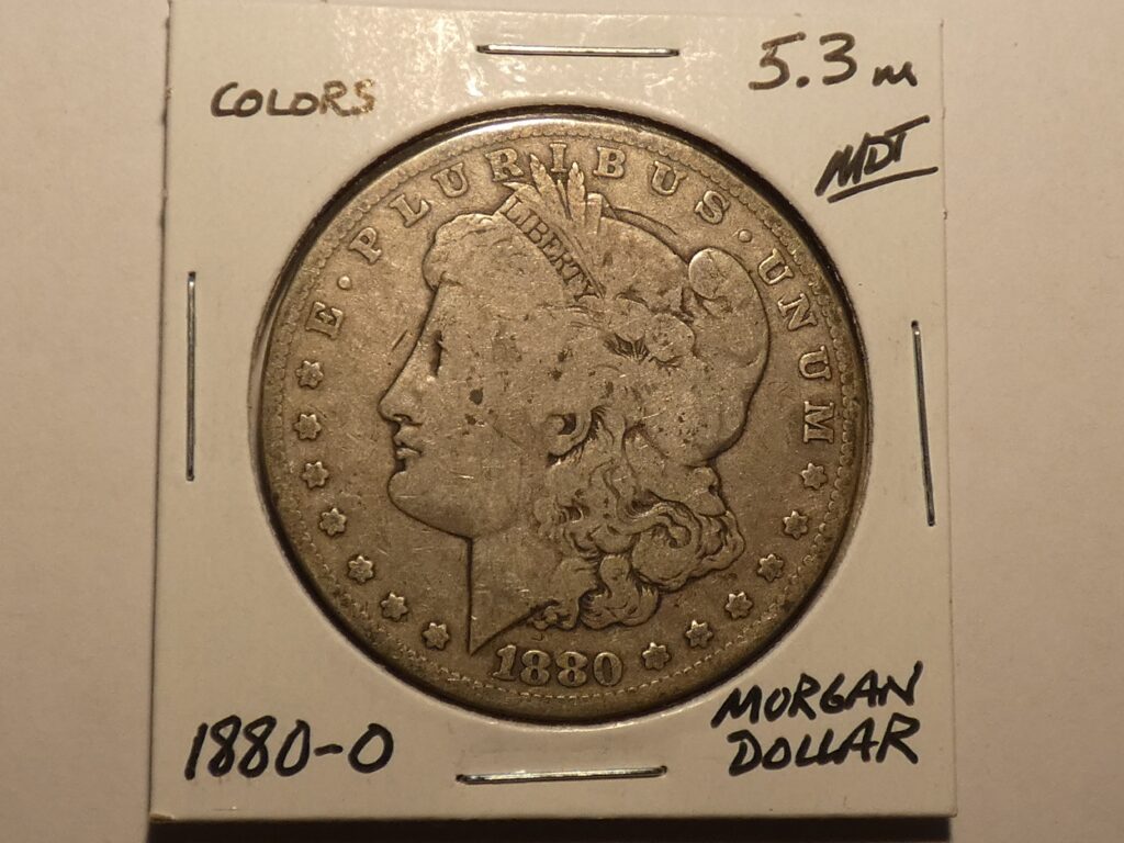 1880 Morgan silver dollar coin.