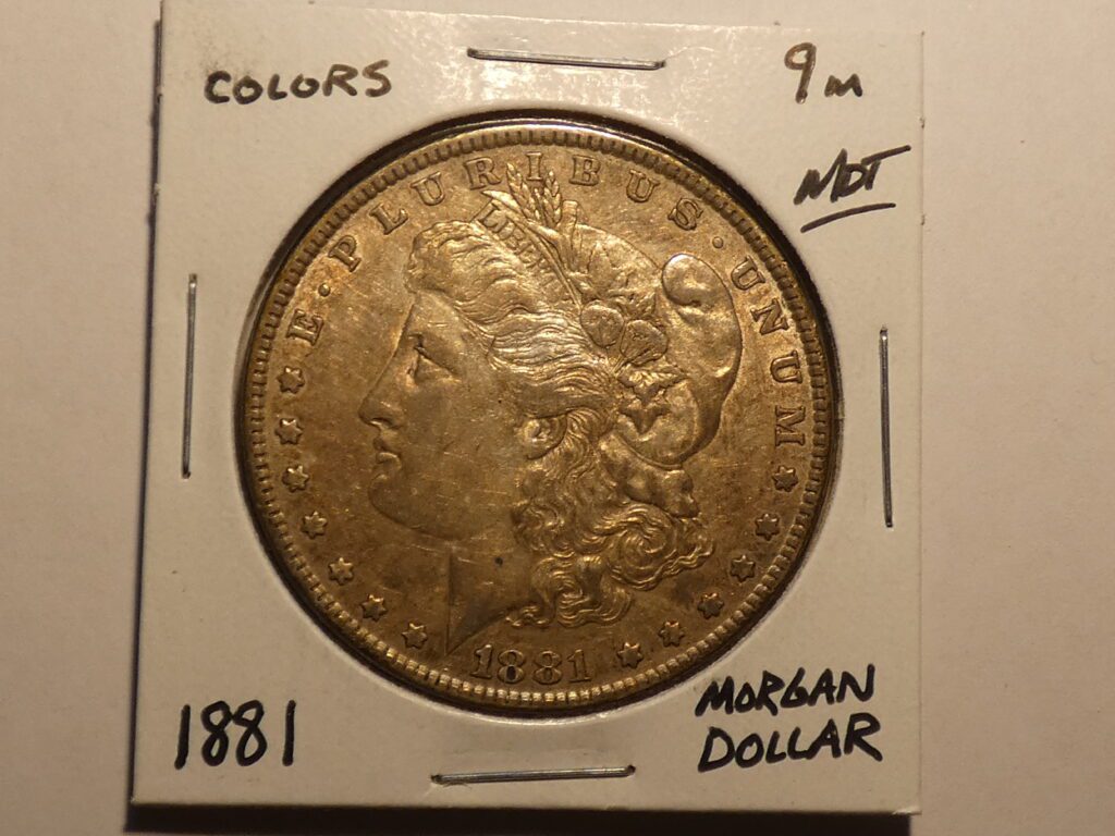 1881 Morgan dollar coin, gold, obverse