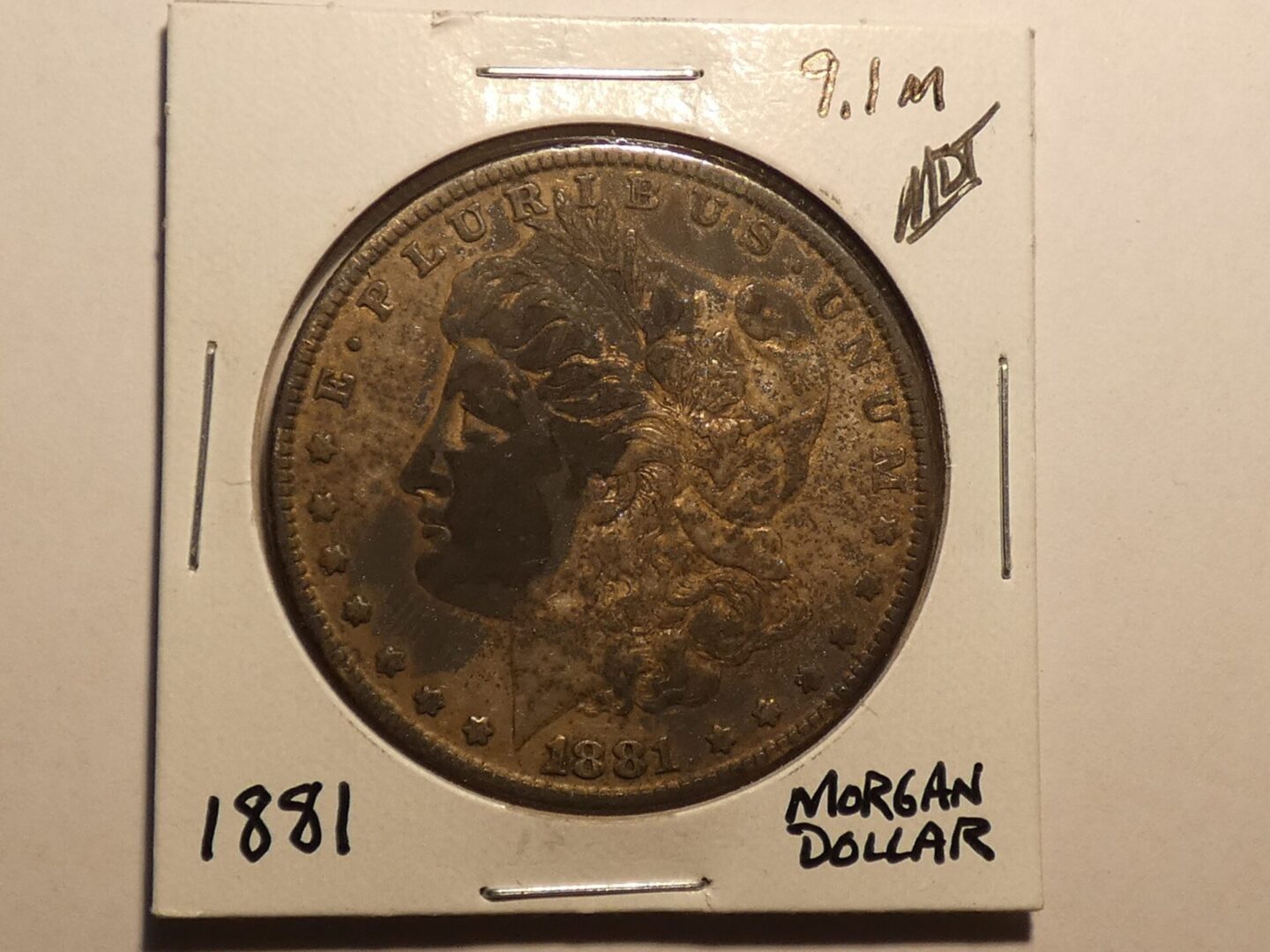 1881 Morgan silver dollar coin.