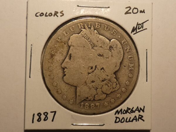 1887 Morgan silver dollar coin.