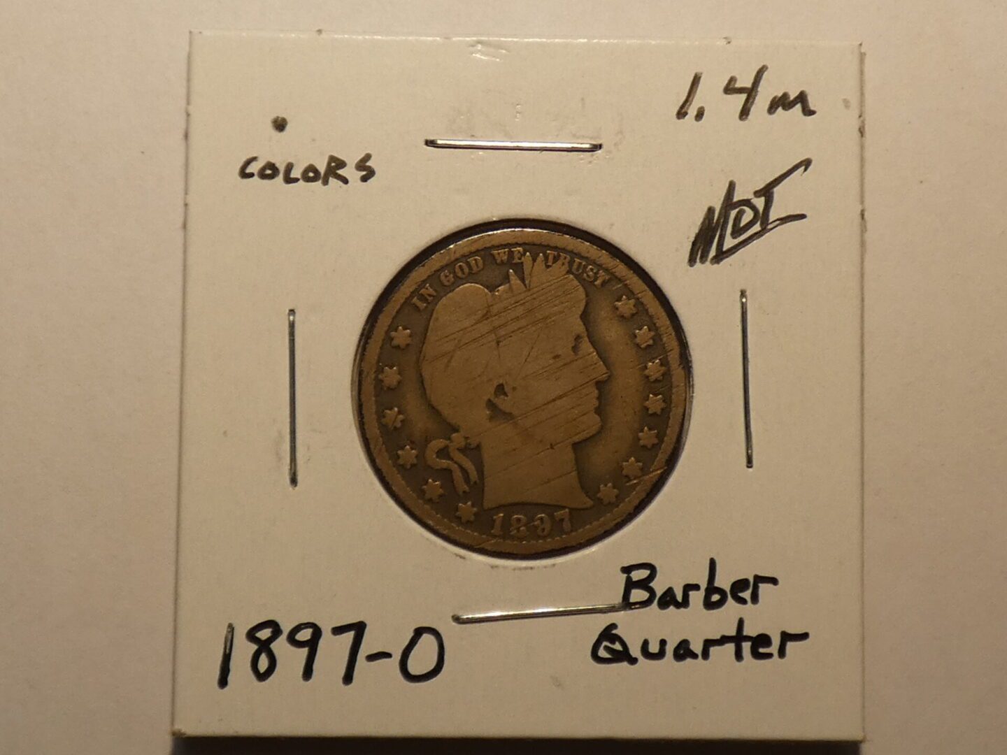 1897 Barber quarter coin obverse.