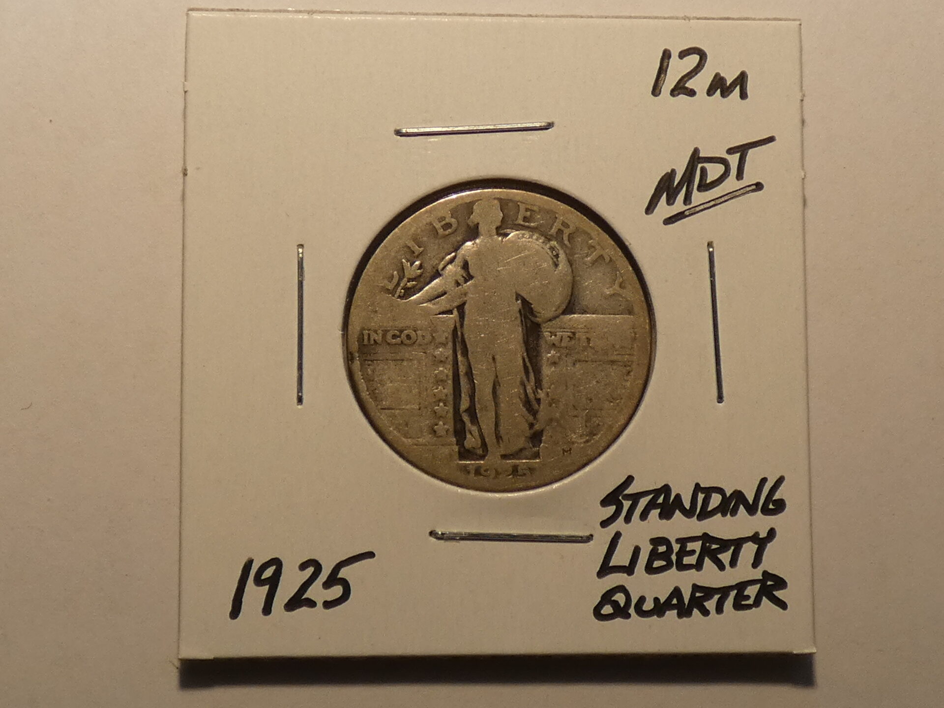 1925 Standing Liberty Quarter coin.