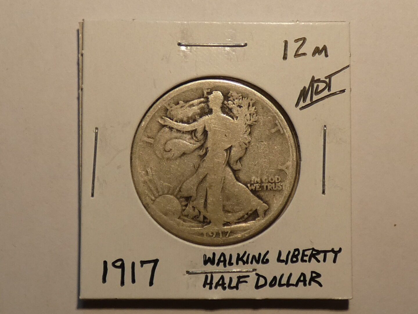 1917 Walking Liberty half dollar coin.