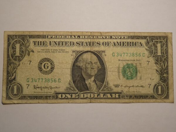 One dollar bill with George Washington.