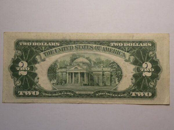 Two dollar bill with Monticello.