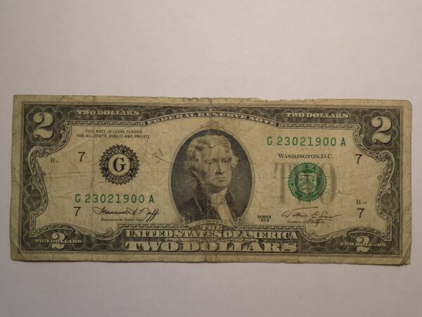 Two dollar bill with Thomas Jefferson portrait.