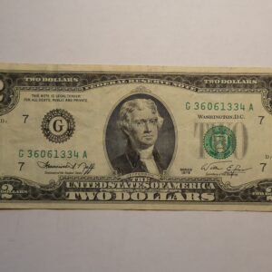 Two dollar bill with Thomas Jefferson portrait.