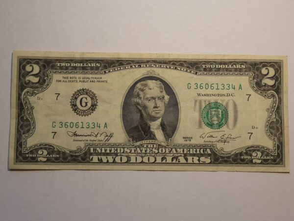 Two dollar bill with Thomas Jefferson portrait.