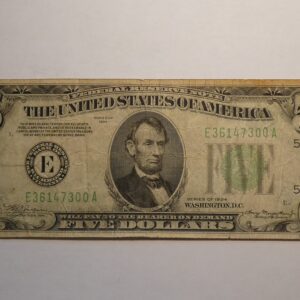 Five dollar bill featuring Abraham Lincoln.