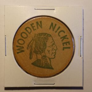 Wooden Nickel token with Native American profile.