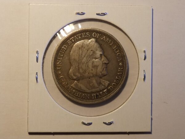 Silver US Columbian half dollar coin.