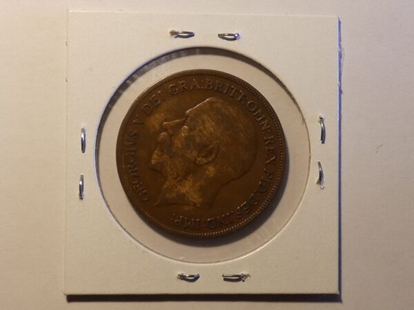 British copper coin with King George V portrait.