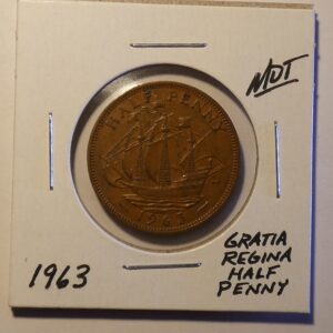 1963 British half penny coin with ship.