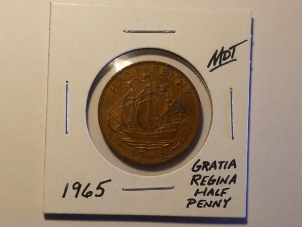 1965 British half penny coin with ship.