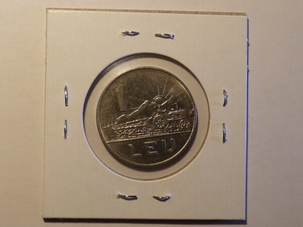 One Romanian leu coin with train design.