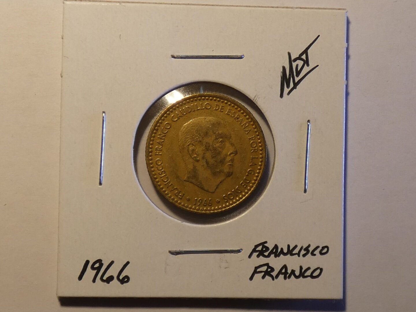 1966 Spanish coin with Francisco Franco portrait.