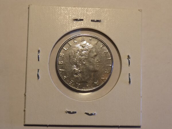 Italian silver coin with a woman's face.