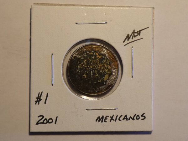 2001 Mexican coin, worn and tarnished.