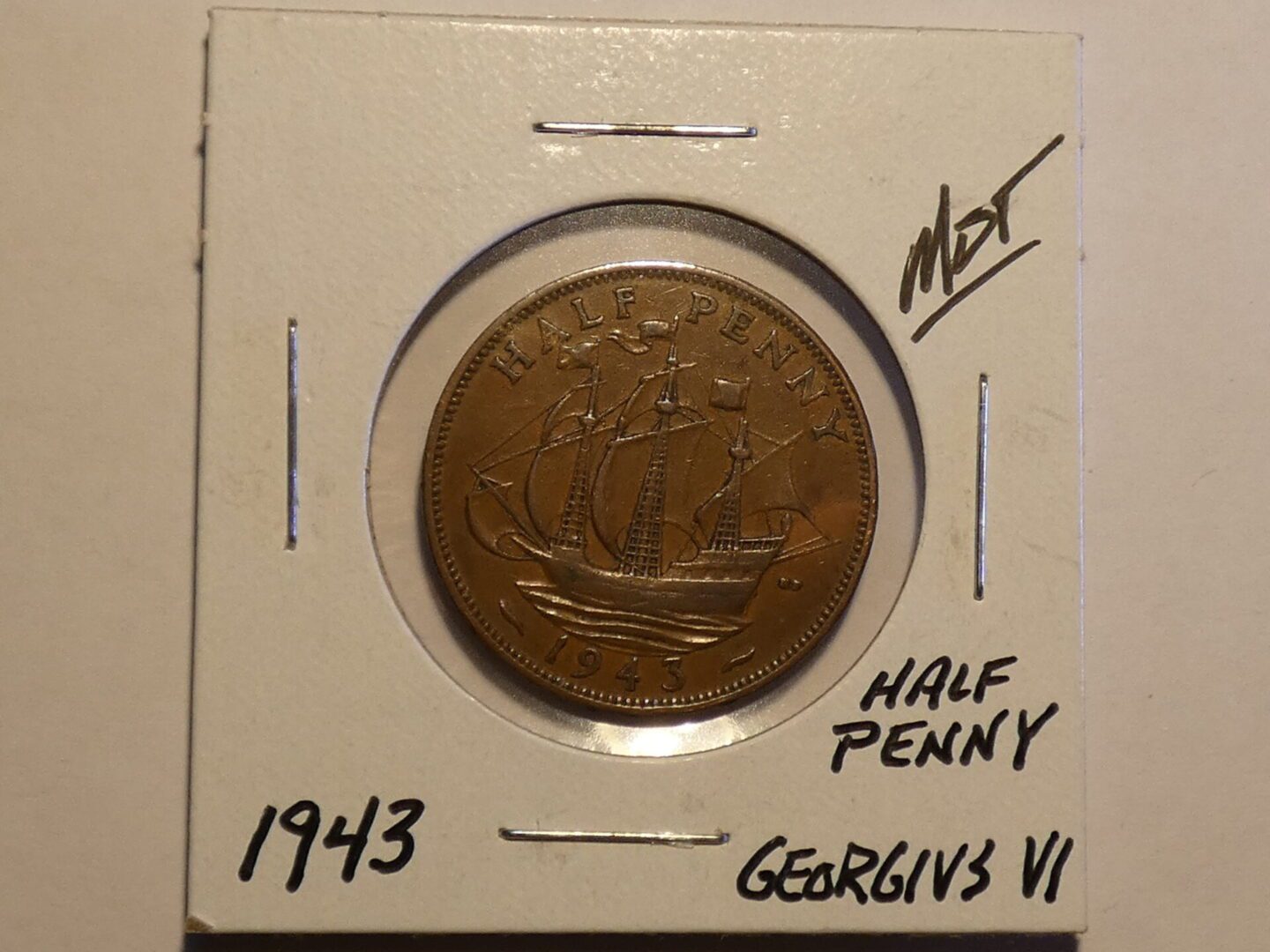 1943 British half penny coin.