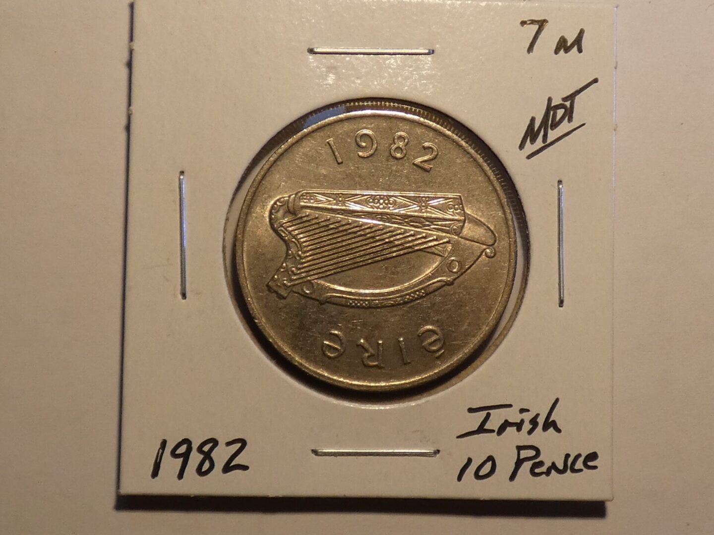 1982 Irish 10 pence coin with harp.