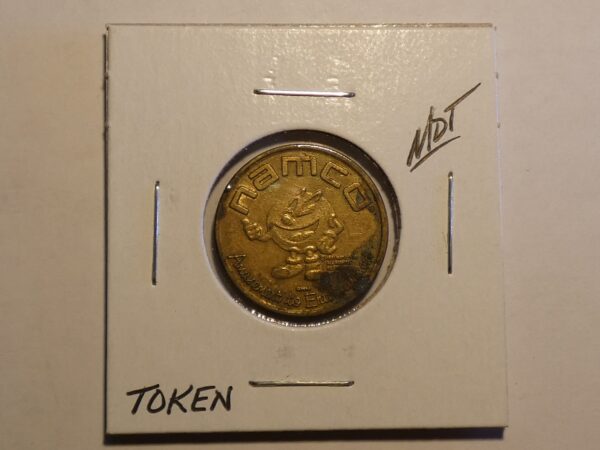 Gold Namco arcade game token.