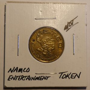 Gold Namco Entertainment token with mascot.