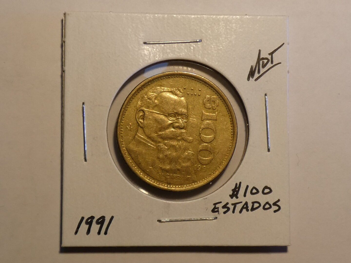 1991 Mexican 100 pesos coin.