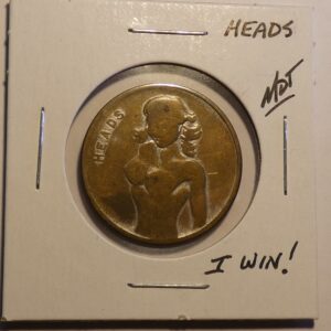 Heads coin with a woman on it.