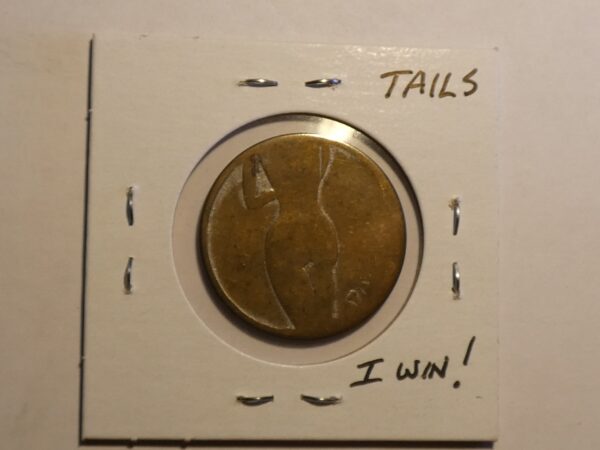 Coin with a woman silhouette, "Tails" and "I win" written.