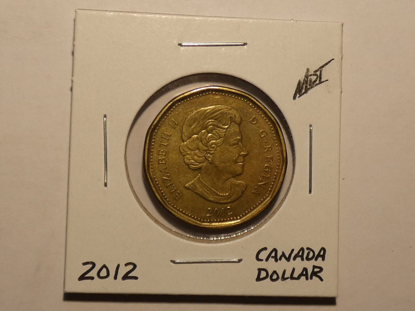 2012 Canadian one dollar coin.