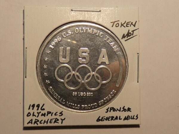 1996 US Olympic Team Token with Olympic rings.