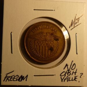 Gold coin with eagle and "Freedom" inscription.