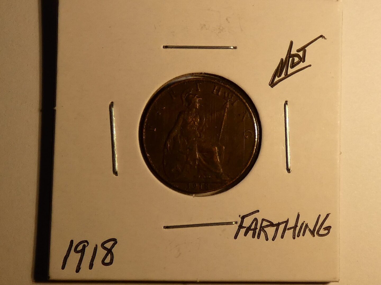 1918 British copper farthing coin.