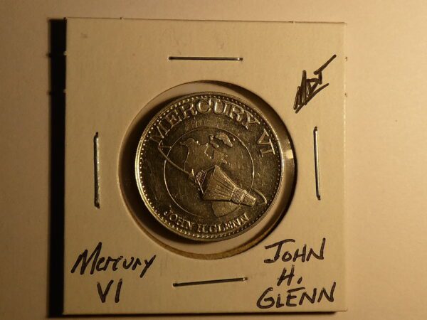 Mercury VI coin with John Glenn's name.